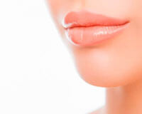Close-up picture of plumped-up lips with fat transfer