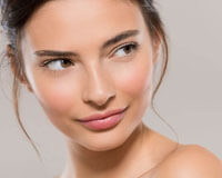 Picture of a smiling woman happy with her pumped up lips after fillers